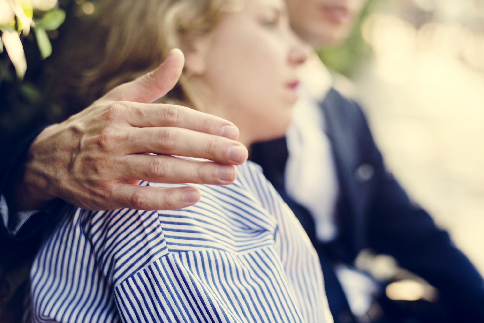 Man consoling an upset girlfriend