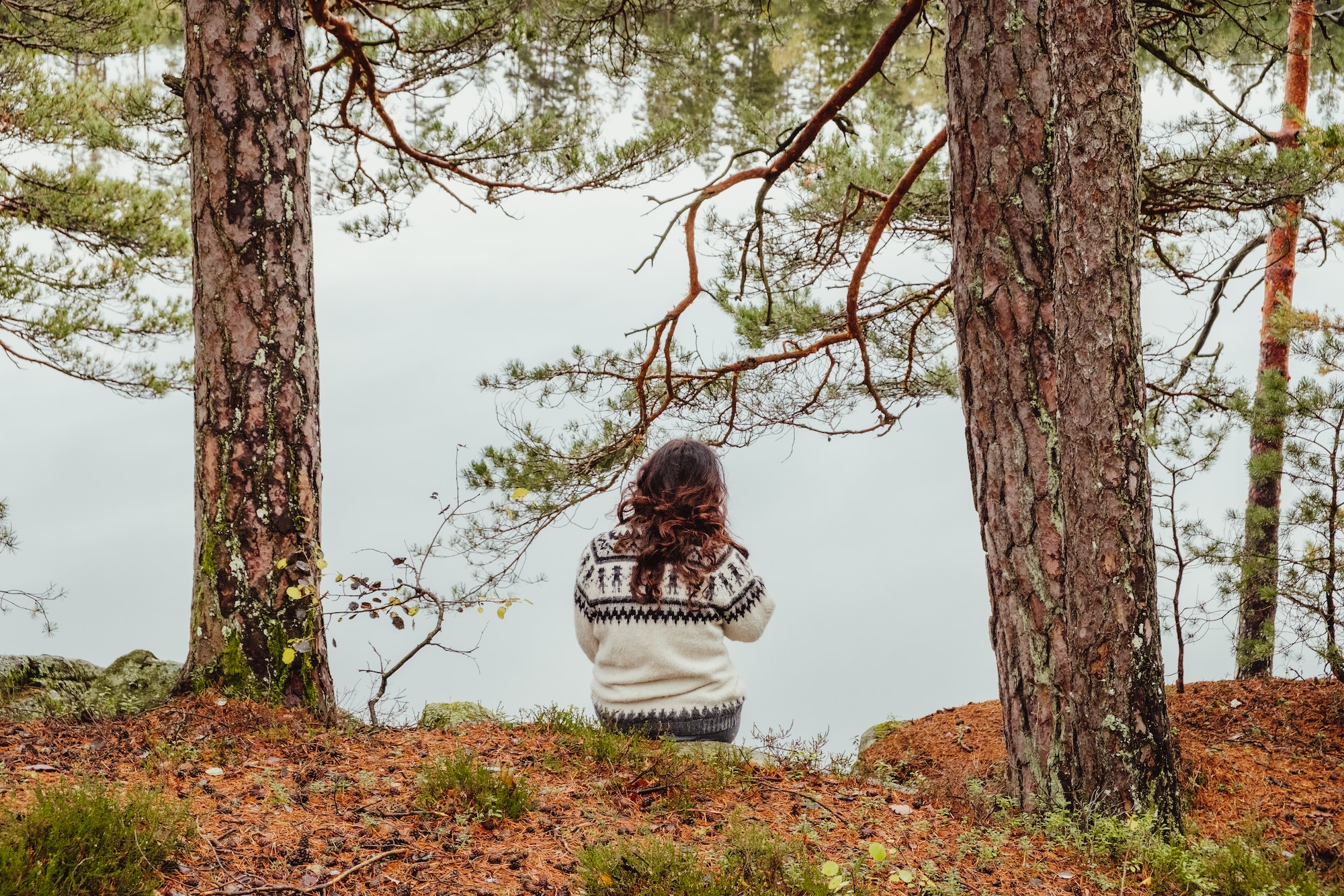 Mindful woman at lake