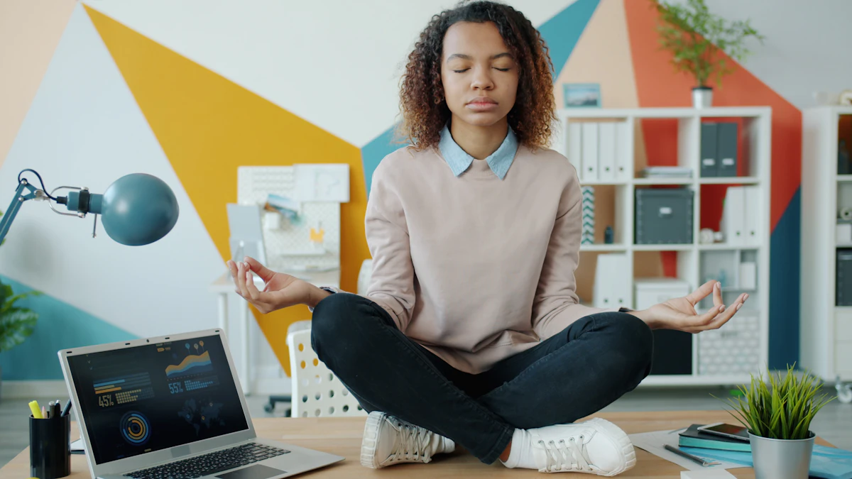 Adult practising a calm pause in a workspace, representing emotional regulation and recovery from rapid escalation.